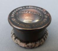 A possible gramophone needle tin named to lid Aladdinite, diameter 4.