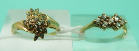 Two 9ct gold rings set with green stones