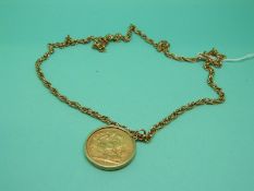 A 1912 George V full gold sovereign in 9ct gold clip mount on 9ct gold chain, weight 19.