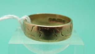 A 9ct gold wedding ring, weight 3.