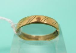 An 18ct gold wedding ring, weight 2.