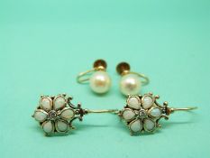 A pair of 9ct gold earrings set with opals and a pair of 9ct gold earrings set with pearls.