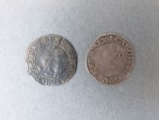 Elizabeth 1st half groat together with a Charles 1st half groat,