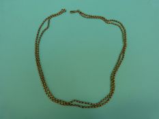 A yellow metal guard chain