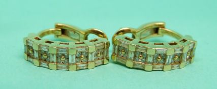 Splendore pair of 18ct gold earrings each set with twenty round brilliant cut diamonds and sixteen