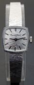 Bueche-Girod 9ct white gold ladies wristwatch with black hands, baton markers and textured face,