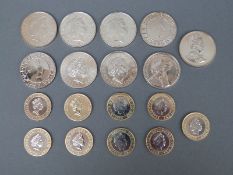 Nine various mint uncirculated five pound coins and nine mint uncirculated two pound coins