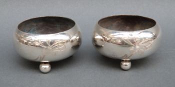 A pair of Russian white metal open salts with 84 silver marks,
