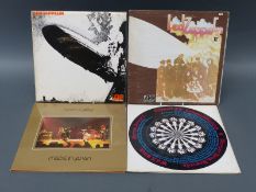 Over forty mostly rock LPs including Led Zeppelin (plum), Hendrix, Curved Air,