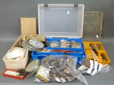A quantity of watch and clock parts,