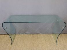 A modern shaped glass hall table,