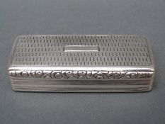 A William IV hallmarked silver snuff box with gilt wash interior and ribbed exterior,
