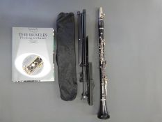 A cased Boosey & Hawkes clarinet,