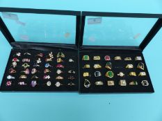 Over 50 rings set with various gemstones