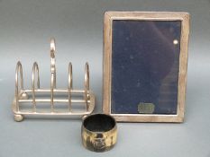 A boxed hallmarked silver photograph frame to suit approx 6 x 4