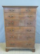 A Georgian oak tallboy chest of two over five drawers,