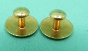 A pair of 18ct gold studs