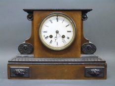 F J Watson Manchester late Victorian mantel clock with ebonised decoration to carved case and