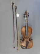 A late 19th/20thC unlabelled violin with 35cm back,