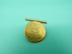 An 1892 ½ pond on yellow metal cufflink mount, weight 5.