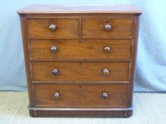 A Victorian mahogany and satinwood or tigerwood chest of two over three drawers,