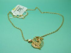 A chain marked 585 and Aquarius pendant marked 585, 12.