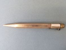 Four propelling pencils including a white metal example,