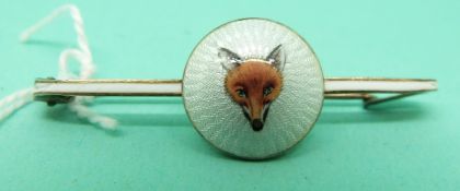 A bar brooch with circular guilloche enamel panel depicting a fox's head