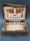 Finnigans George V hallmarked silver mounted cased gentleman's travelling vanity set,