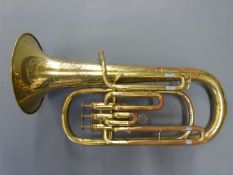 A brass tenor horn in original case (serial no B08822) with mouthpiece