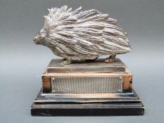 A Mappin & Webb George V hallmarked silver novelty vesta/match striker formed as a porcupine,