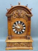 A German Black Forest shelf cuckoo clock with carved decoration,