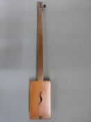 A handmade single strung mahogany square bodied acoustic instrument,