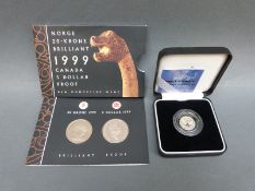A cased 2001 silver proof Britannia 20 pence coin with certificate,