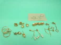 Seven pairs of 9ct gold earrings to include faux pearls etc