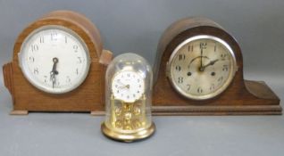 A two train Napoleon hat cased English mantel clock with Arabic dial,