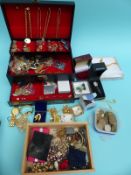 A collection of costume jewellery to include earrings, necklaces,