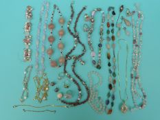 A collection of rose quartz jewellery, beaded necklaces, Venetian beads,