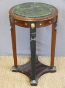 A 19thC mahogany marble inset circular table or jardiniere stand with carved mask decoration and