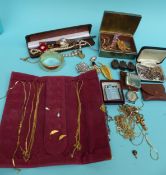 A collection of costume jewellery to include silver chain, Ronson lighter, brooches,