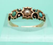 A 15ct gold ring set with a seed pearl and turquoise,