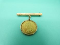An 1887 Jubilee head gold full sovereign mounted as a brooch, on a 9ct gold bar, weight 11.