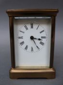 Late 19th/early 20th century French timepiece carriage clock in 'corniche' style brass case,