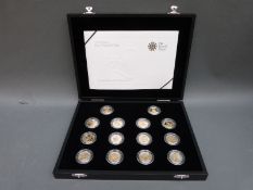 A UK 25th Anniversary silver proof coin collection comprising 14 £1 coins with certificate,
