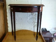 A hall table with serpentine drawer,