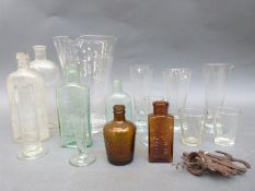 A quantity of medical/laboratory glassware to include conical measures with Government stamp,