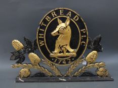 A vintage fibreglass Whitbread sign,