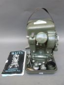 A cased Hilger Watts theodolite and wooden stand with recalibration receipt