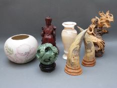 A quantity of Oriental items to include soapstone puzzle ball, clay dragon, horn,