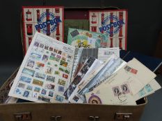 A suitcase containing albums, stockbooks, covers,